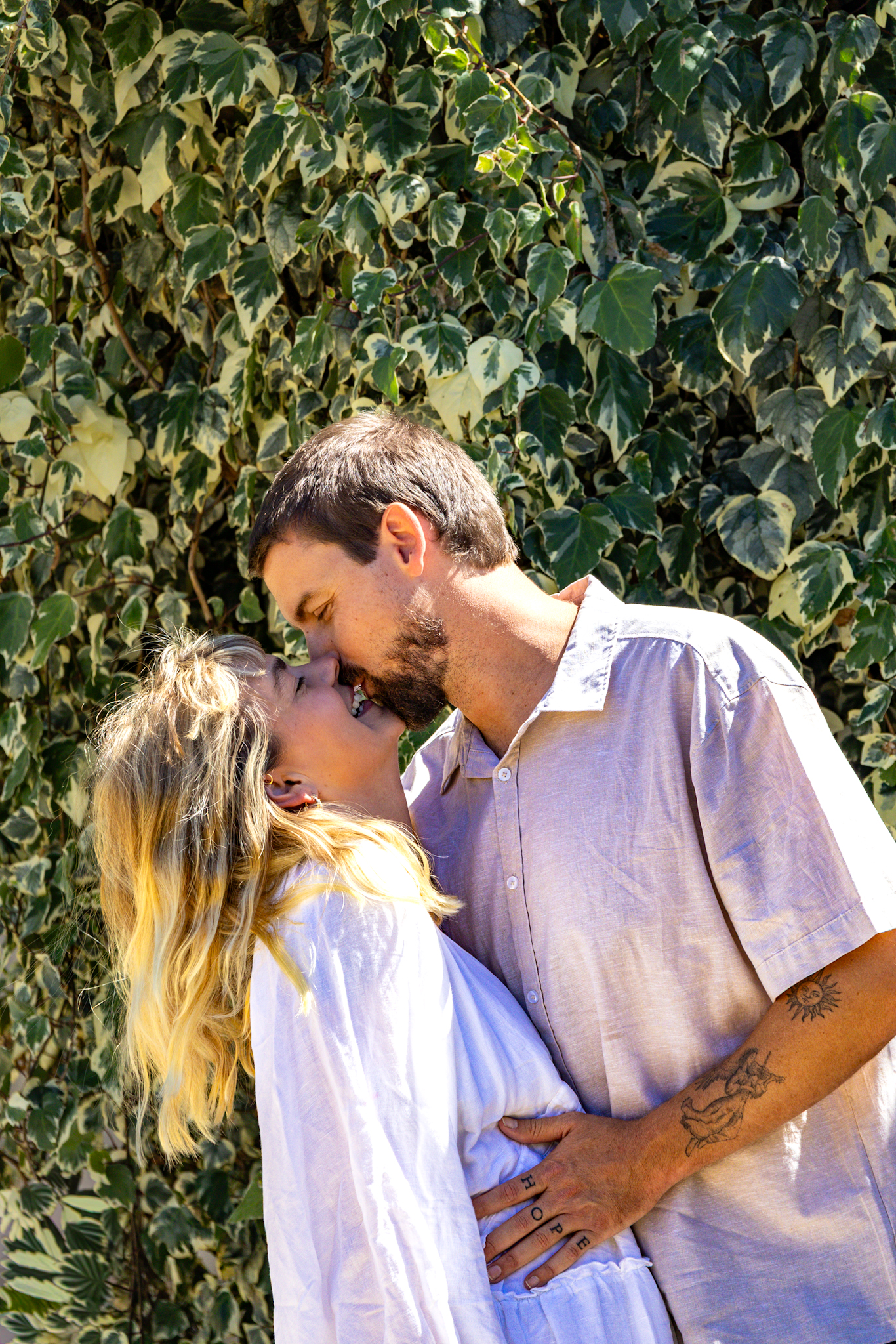 Candid couple and maternity photoshoot at sunset in Perth